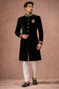 Black Velvet Sherwani with Gold Embroidery & Paisley Motif – Designer Groom Wedding Outfit