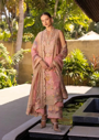 Elegant Blush Pink Embroidered Salwar Kameez in Tropical Luxury Setting